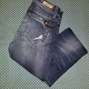 Buckle black skinny jeans